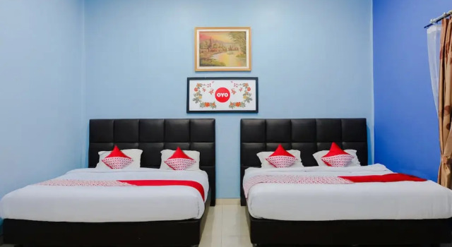 Suite quadrupla familiare OYO 778 Guest House Amalia Malang