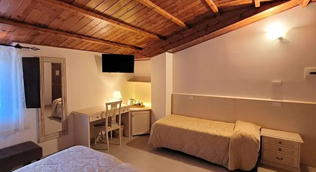 Трёхместный номер Domus Romulea