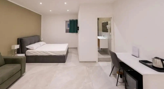 Четырёхместный номер Deluxe Suites Gaudioso Napoli center