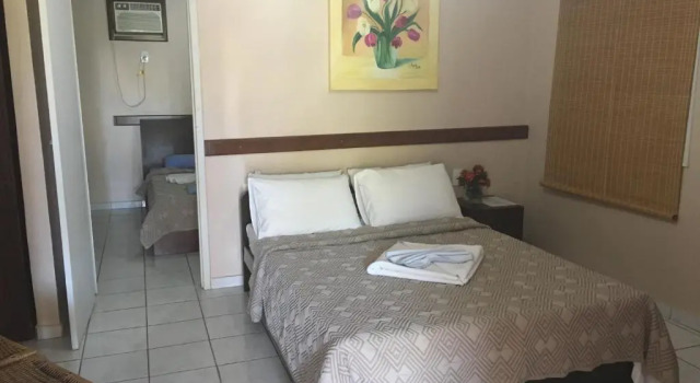 Четырёхместный номер Superior с балконом и с красивым видом из окна Hotel Pousada Caminho da Praia