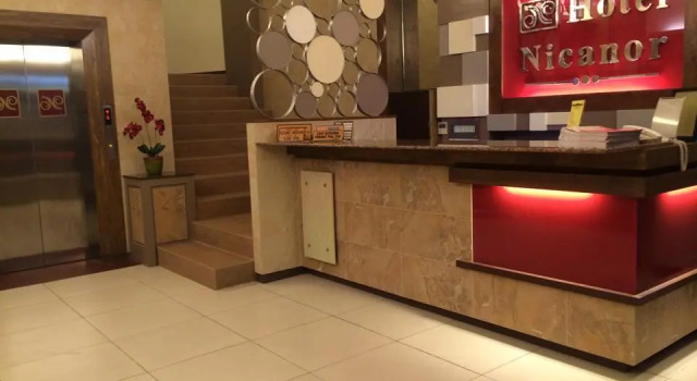 Кровать в общем номере Hotel Nicanor