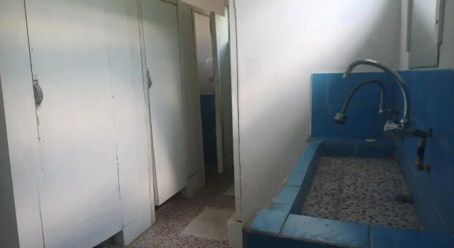 Кровать в общем номере Bluepango Guest House