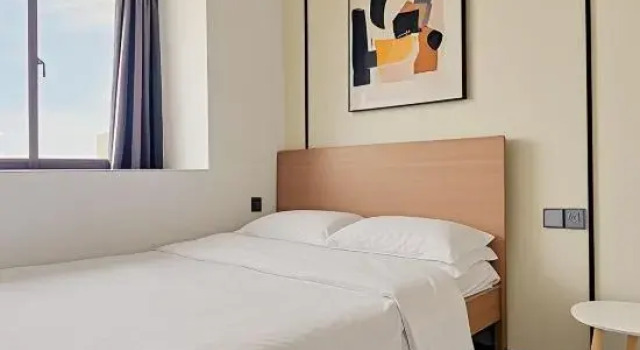 Двухместный люкс Woniu Lvdou Scenic Apartment (Beibuwan No. 1)