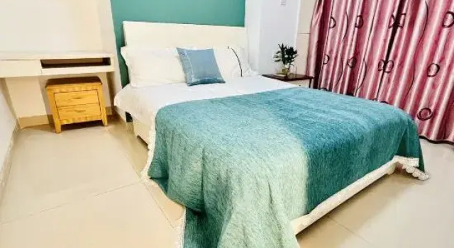 Двухместный люкс с балконом Shuyuan hotel apartment (Lihai Asia international store, Nanning)