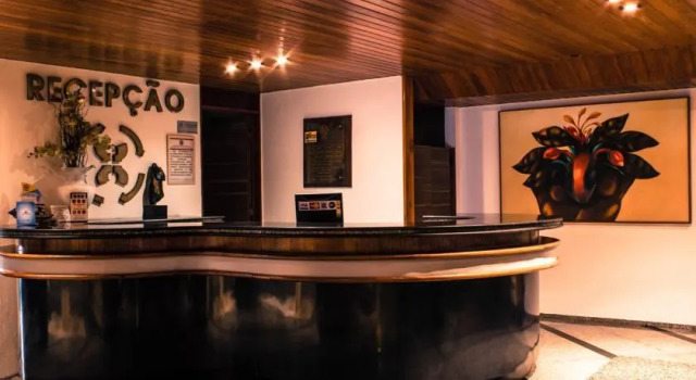 Кровать в общем номере Xênius Hotel