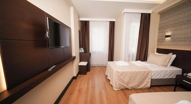 Четырёхместный номер Deluxe Bellezza Hotel