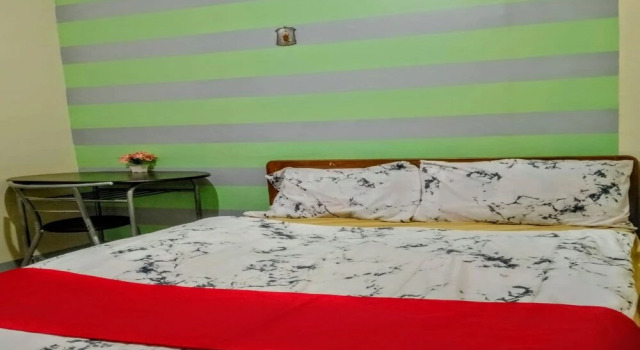 Habitación doble De lujo OYO 1062 Casa Edna Microtel And Function