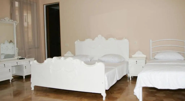 Четырёхместный номер Standard с видом на сад Two Towers Guest House