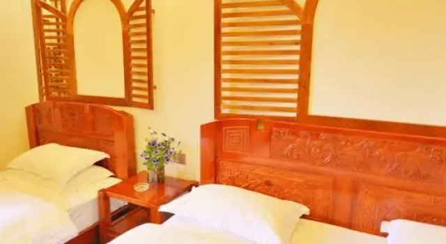 Lijiang Rongshe Liyuan Inn, Забронировать Отель Лицзян Юньнань, рядом с Улица Сквер-стрит Древнего города Даянь
