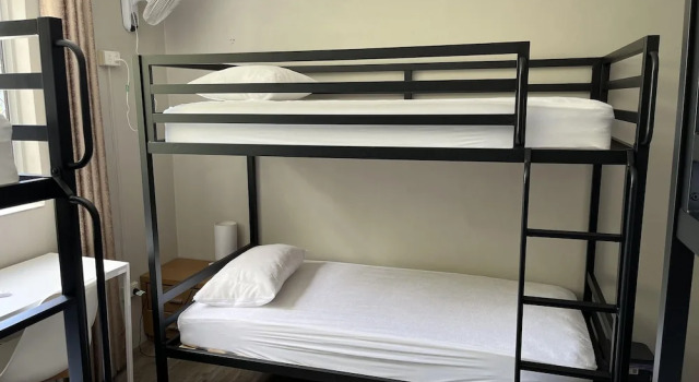 Кровать в общем номере Homely Inn Hostel