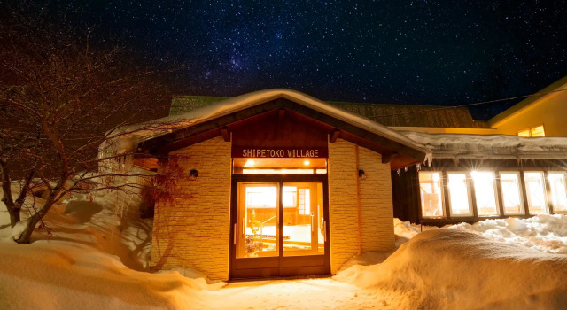 Кровать в общем номере Shiretoko Village