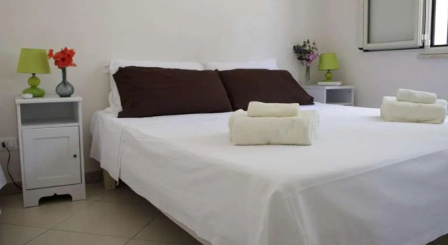 Apartment 2 Schlafzimmer mit Gartenblick Itaca Residence Marsala