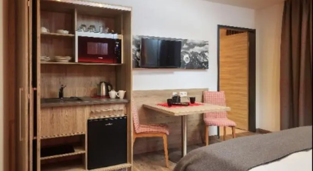 Четырёхместный семейный номер Standard Allgäu Art Hotel