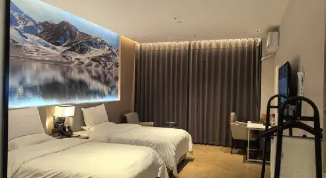 Кровать в общем номере Yutian Alamasi Yu Cultural Themed Hotel