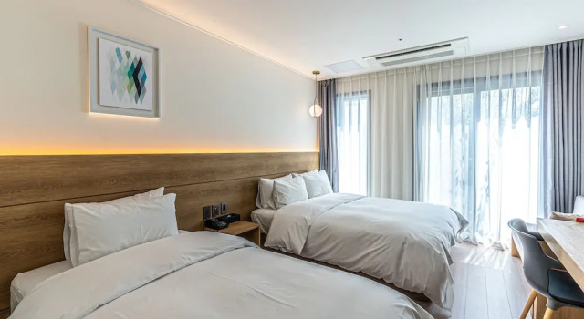 Двухместный семейный номер Standard Hotel The Grang Jungmun