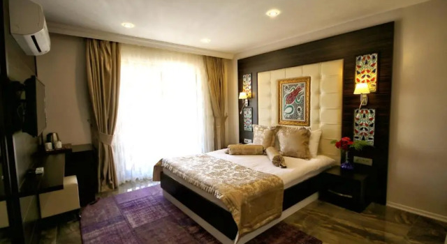 Четырёхместный номер Venus Suite Hotel