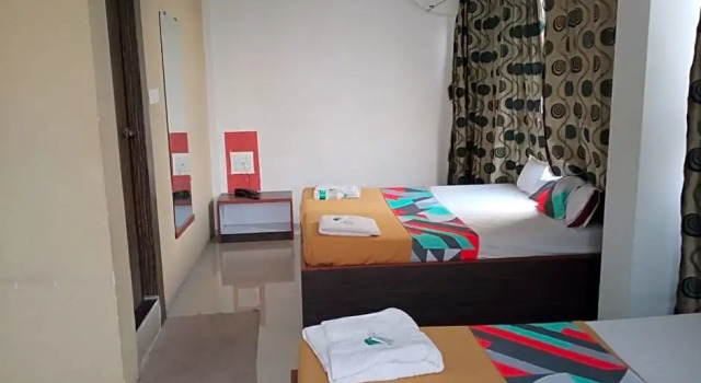 Четырёхместный номер Deluxe с красивым видом из окна Hotel Malhar Palace
