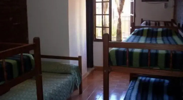 Кровать в общем номере El Guembe Hostel House