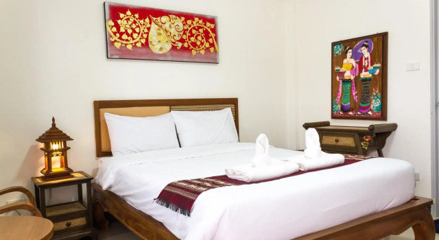 Кровать в общем номере DPHouse center of Old Chiang Mai