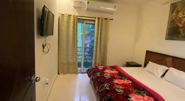 Апартаменты Deluxe 11Flowers Service Apartment By GRB