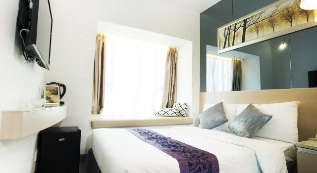 Кровать в общем номере M1 Yau Ma Tei Hotel