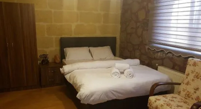Kazanci Tashan Otel, Забронировать Отель  