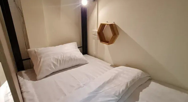 Кровать в общем номере De Chalet