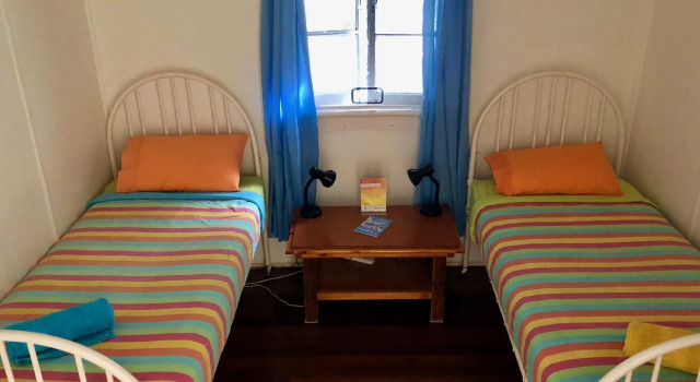 Кровать в общем номере Arcadia Beach Guest House