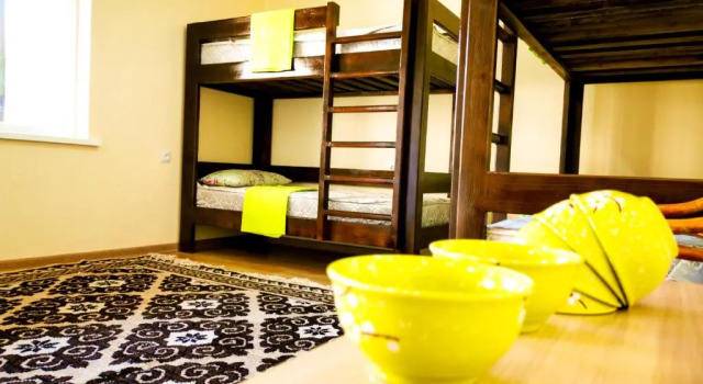 Кровать в общем номере Kurak Homestay