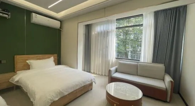 Семейный люкс Yuqi Moyuan Homestay (Haidian Island Hainan University)