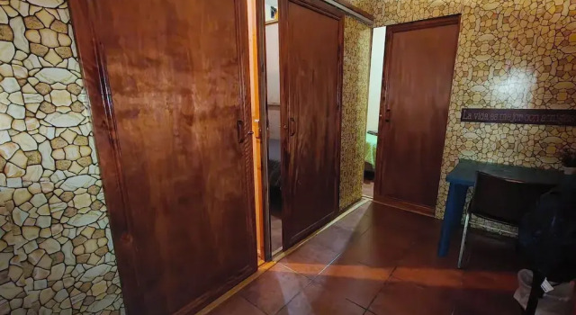 Кровать в общем номере Hosteria del Centro