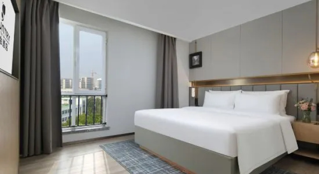 Люкс Luxury Country Inn & Suites by Radisson Hotel (Tianjin Konggang Binhai International Airport)
