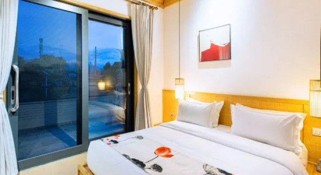 Двухместный семейный люкс с частичным видом на море Dali Moyu Shanhai Hotel