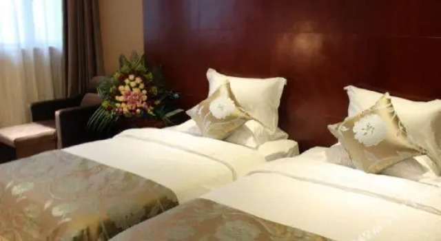 Hua Tai Jin An International Hotel, Buchen Sie Hotel Qujing Yunnan
