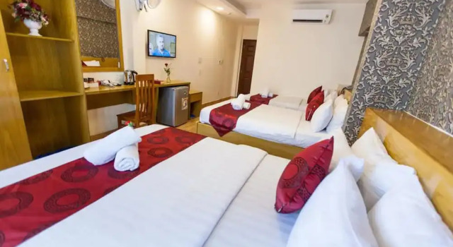 Кровать в общем номере Ailen Garden 2 Hotel