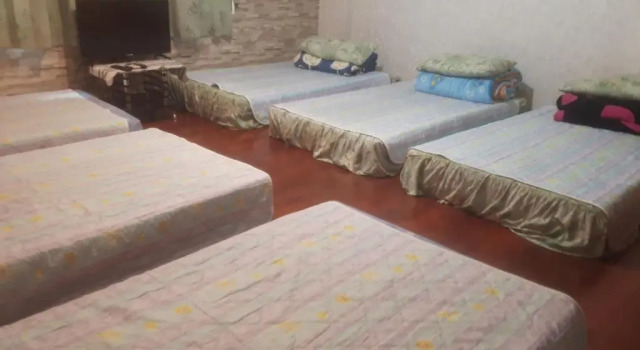Кровать в общем номере Dai Yi Shia B&B