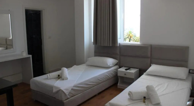 Четырёхместный номер Standard с балконом и с видом на море Hotel Myrtai - City Center
