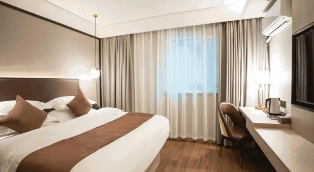 Номер Deluxe GYA Shanghai Jiangpu Hotel