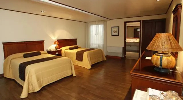 Трёхместный номер Standard Suites Colibri