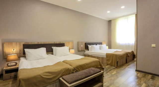 Четырёхместный номер Standard Suntower Hotel
