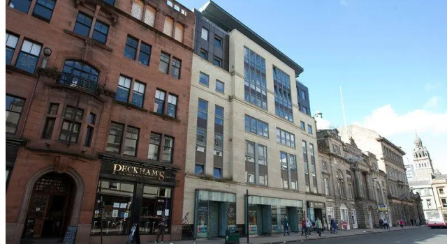 Кровать в общем номере Мансарда The Spires Serviced Apartments Glasgow