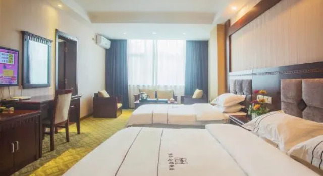Трёхместный люкс Deluxe Duomi Chain Hotel (Lijiang Ancient City)