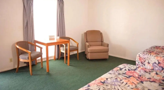 Четырёхместный номер Comfort Wayfarer Inn Woodward
