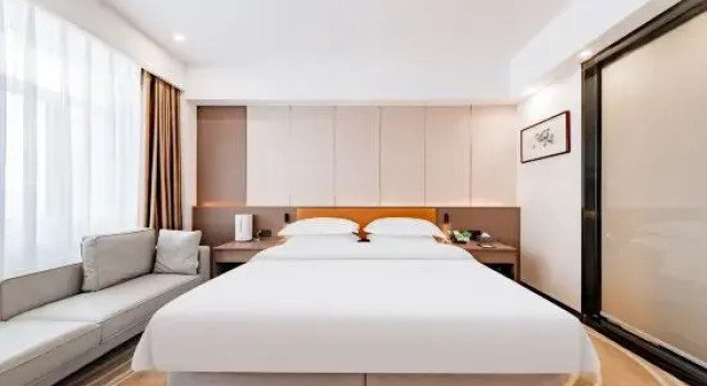 Кровать в общем номере Kaisheng Hotel Hohhot（Former Inner Mongolia Military Region Guesthouse）