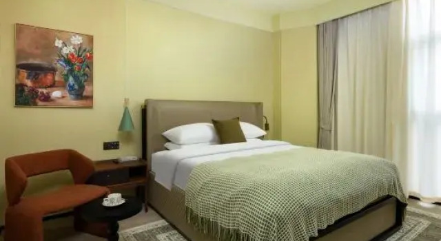 Люкс Deluxe Qishe Hotel (Wanda Plaza Yunjin Road Subway Station)
