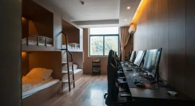Кровать в общем номере Wuzhou Boutique Hotel