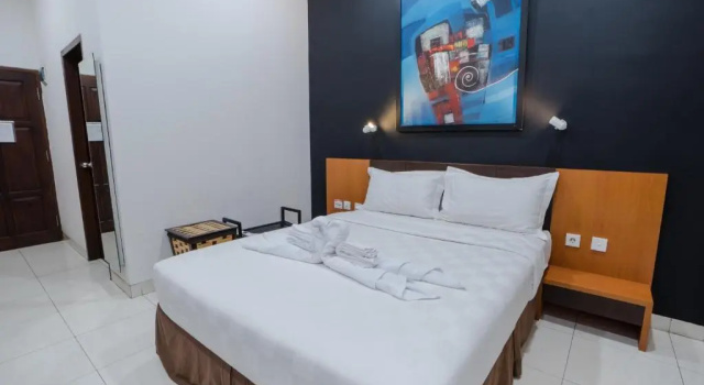 Номер Deluxe Jambuluwuk Heritage Menteng Suites