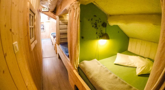Кровать в общем номере Relais des Merveilles