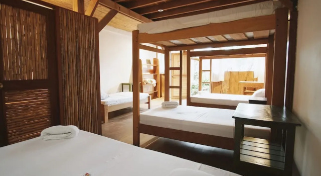 Кровать в общем номере La Fauna Hotel