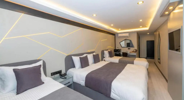 Четырёхместный номер Deluxe White Corner Hotel